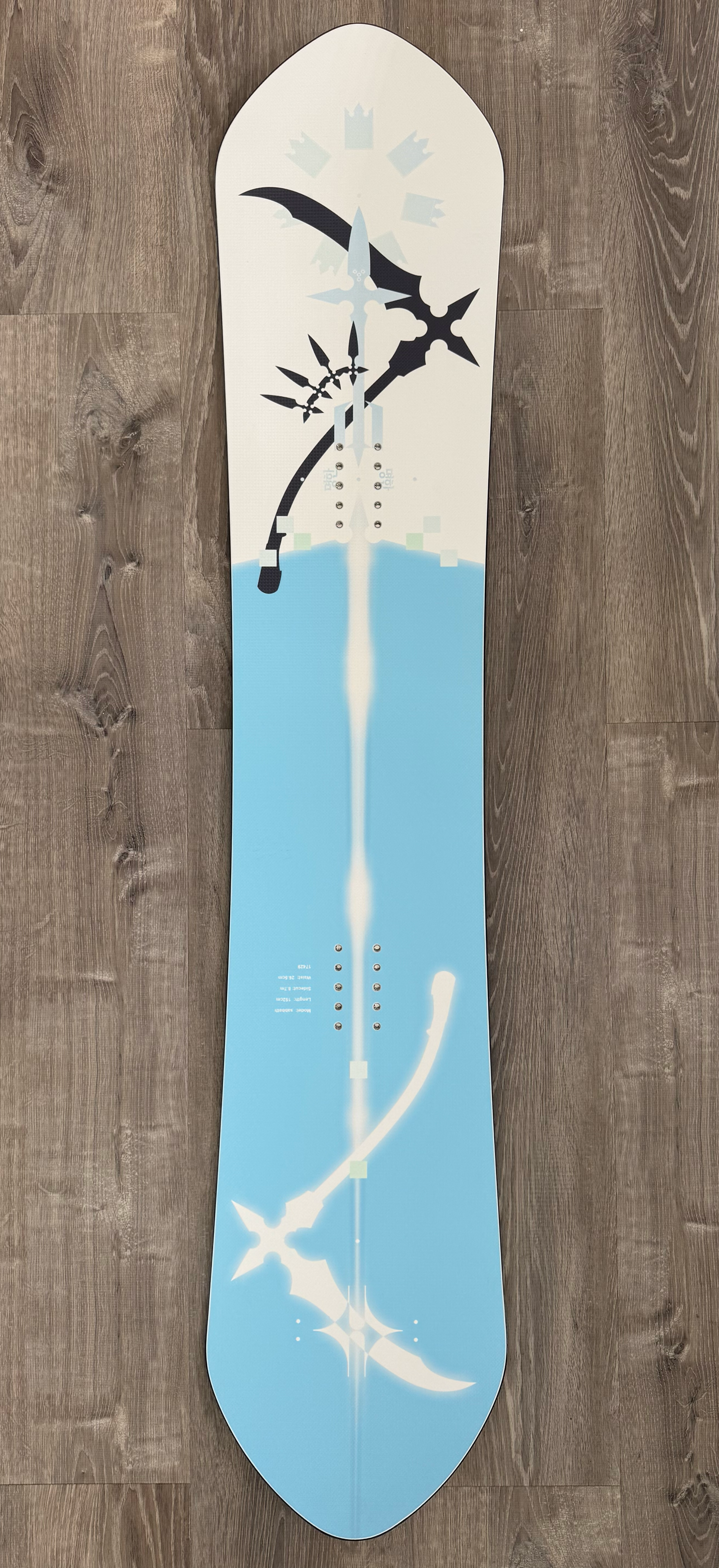 Scythe snowboard on the ground